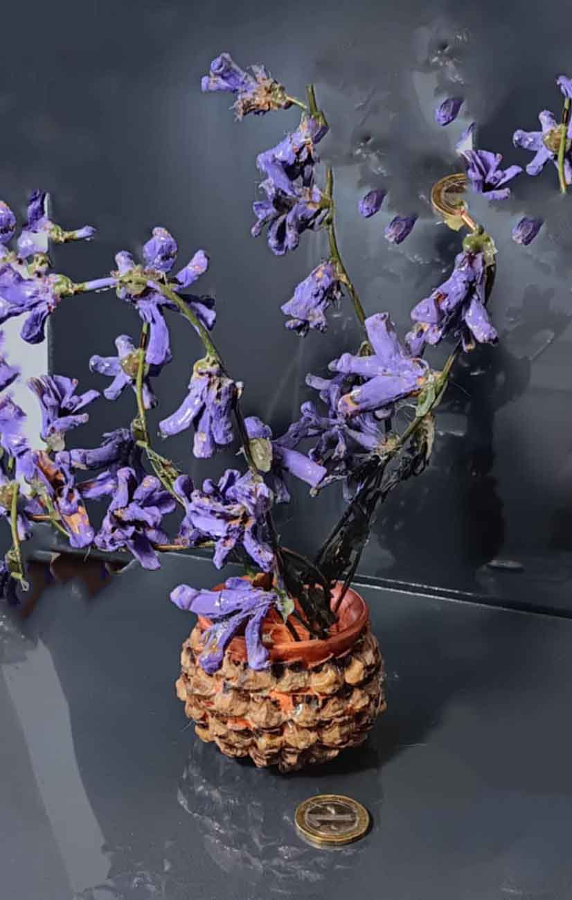 Handmade bouquets of pine cones in vases-from the Mountains