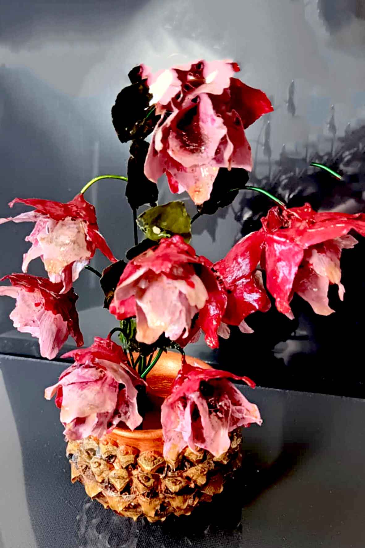 Handmade bouquets of pine cones in vases-from the Mountains