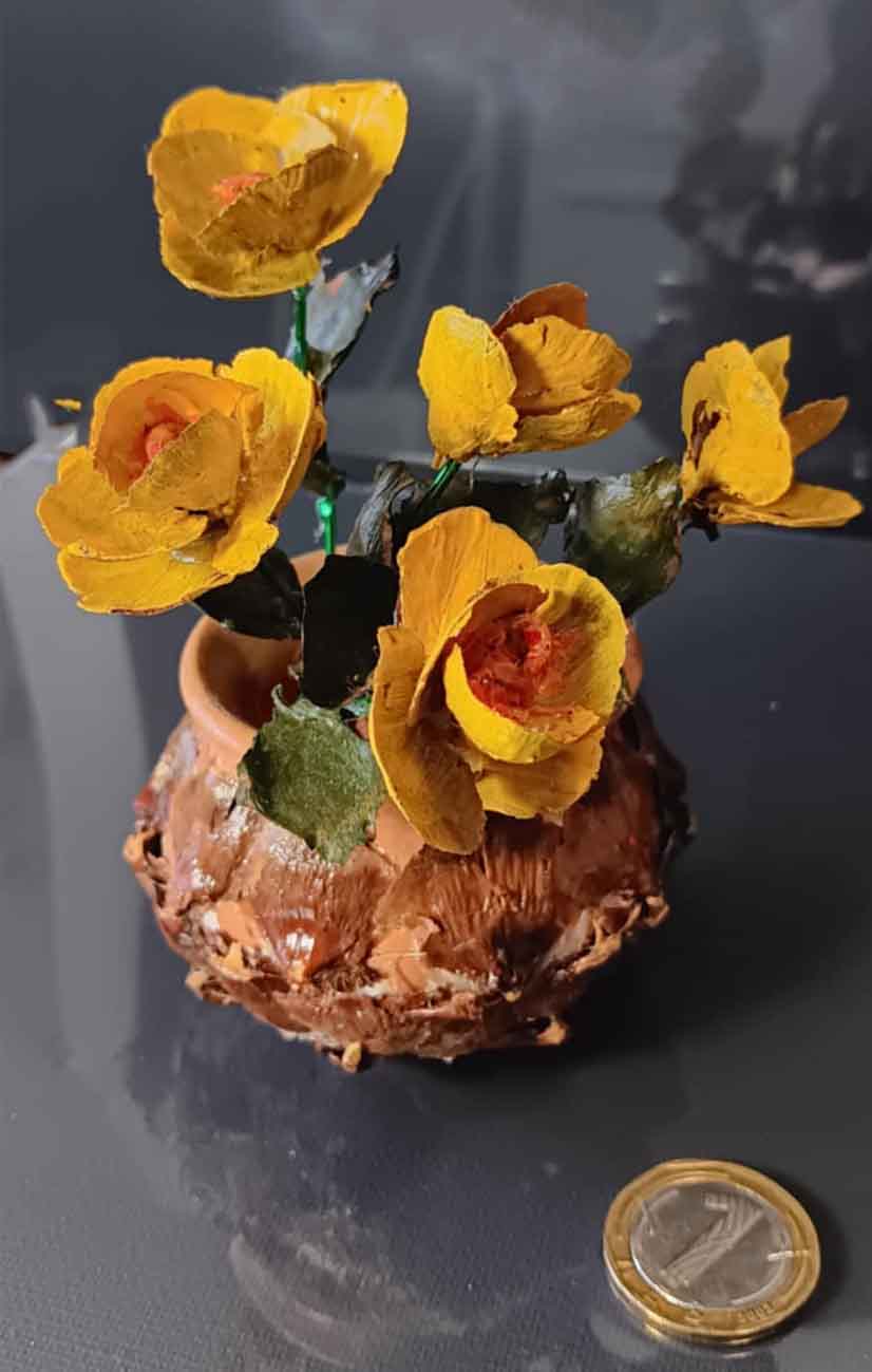 Handmade bouquets of pine cones in vases-from the Mountains
