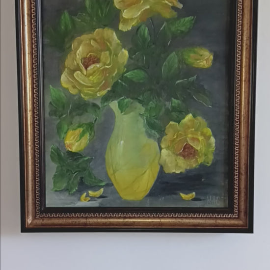 "Mystery of Yellow Roses" -An original still life oil painting of vibrant yellow roses in a yellow vase against a dark grey background, enclosed in an ornate gold frame.