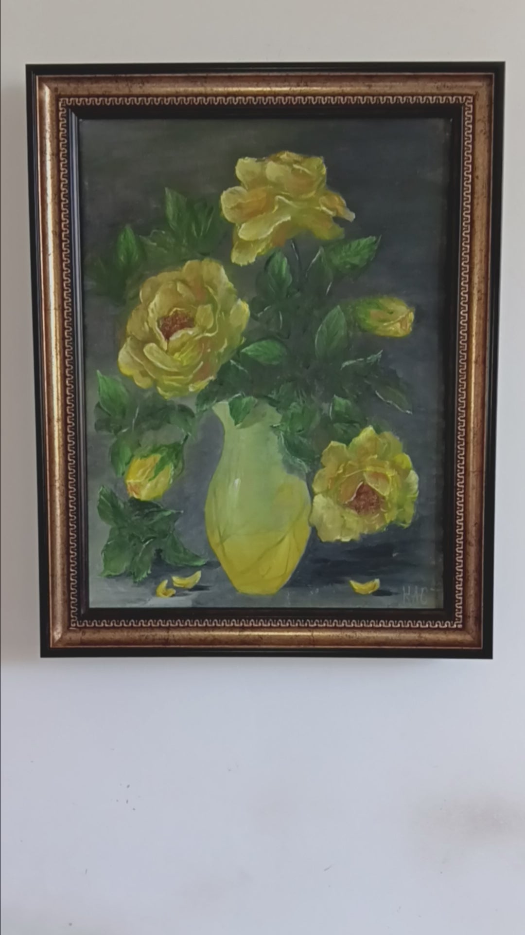 "Mystery of Yellow Roses" -An original still life oil painting of vibrant yellow roses in a yellow vase against a dark grey background, enclosed in an ornate gold frame.