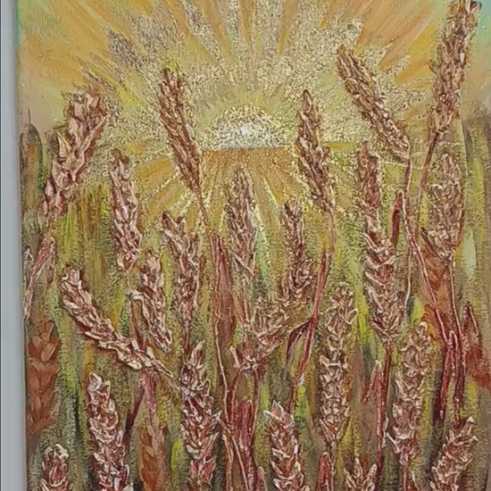 A contemporary 30x40cm vertical painting showing a sun with golden rays rising over a field of wheat. The wheat stalks and sunbeams are created with thick structural paste and gold leaf, giving a 3D effect against a soft sky.